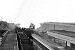 Tuxford Central Station looking West. Goods train passing - 29/01/1955